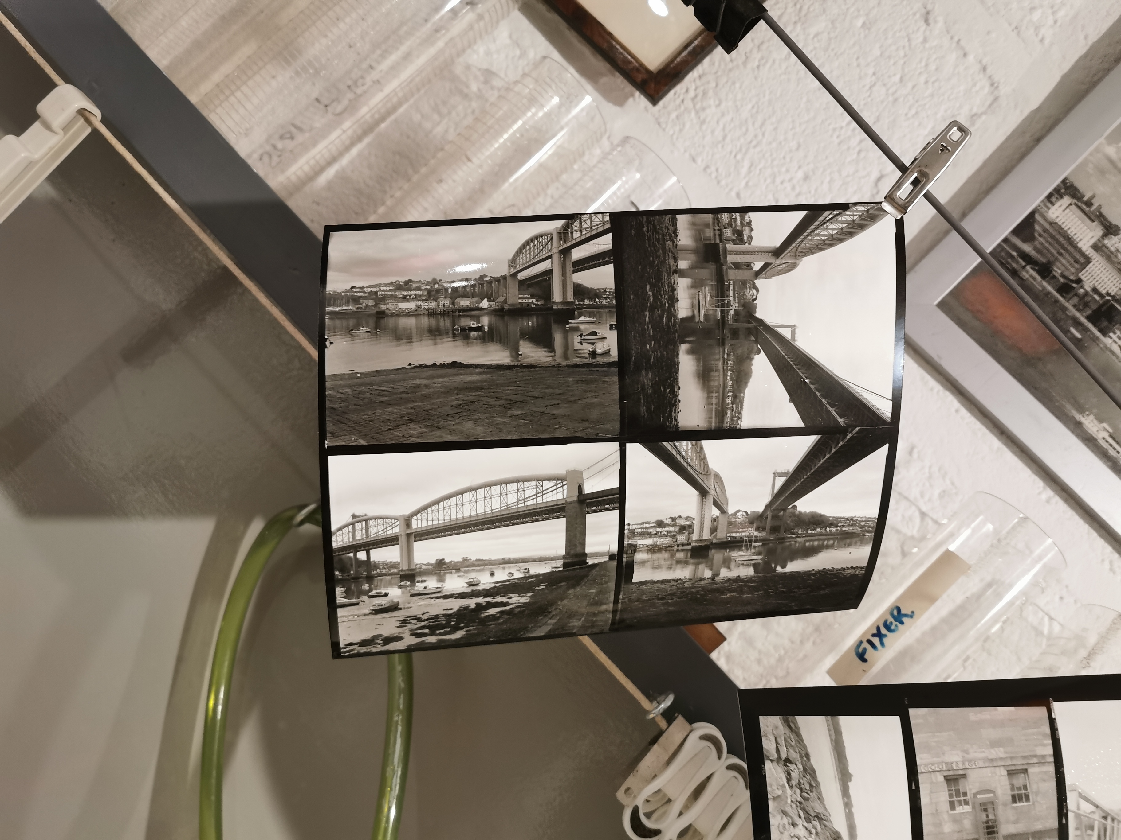 Images from my Darkroom Plymouth course, images of a bridge that was photographed. Darkroom interior and the large contact sheet of negatives.